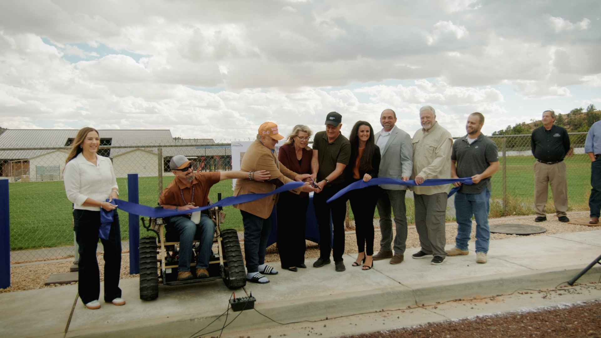 Ribbon cutting ceremony at Maxwell Park with community members